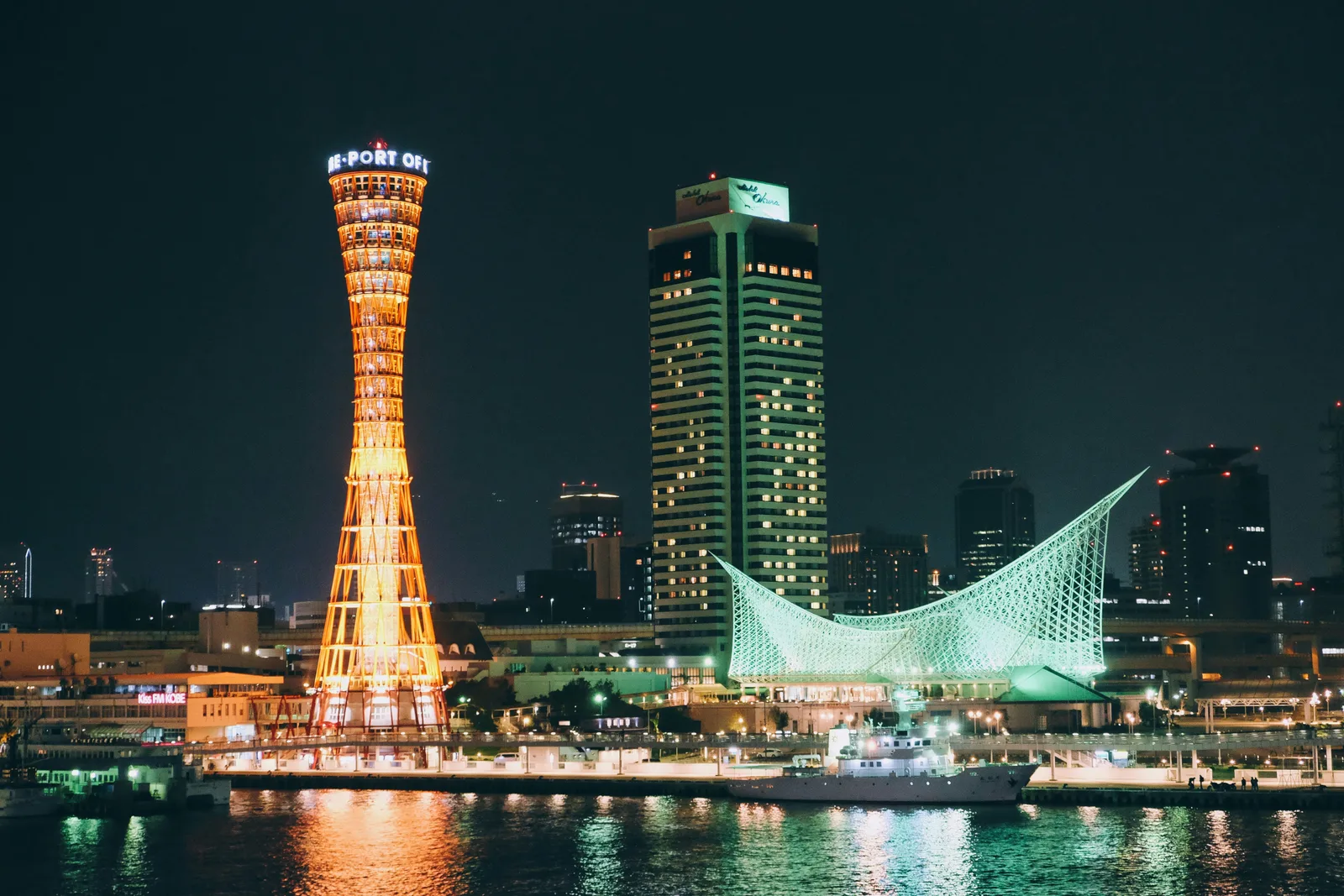 Kobe Port Tower and harbour at dusk during a language stay in Kobe, Japan