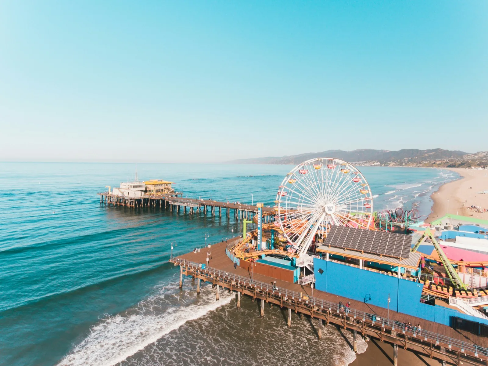 Santa Monica Pier and Ferris wheel at sunset, a highlight of a language stay in Santa Monica